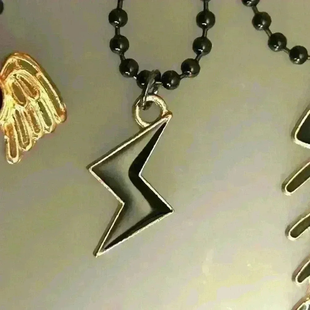 90s style black lightning charm necklace